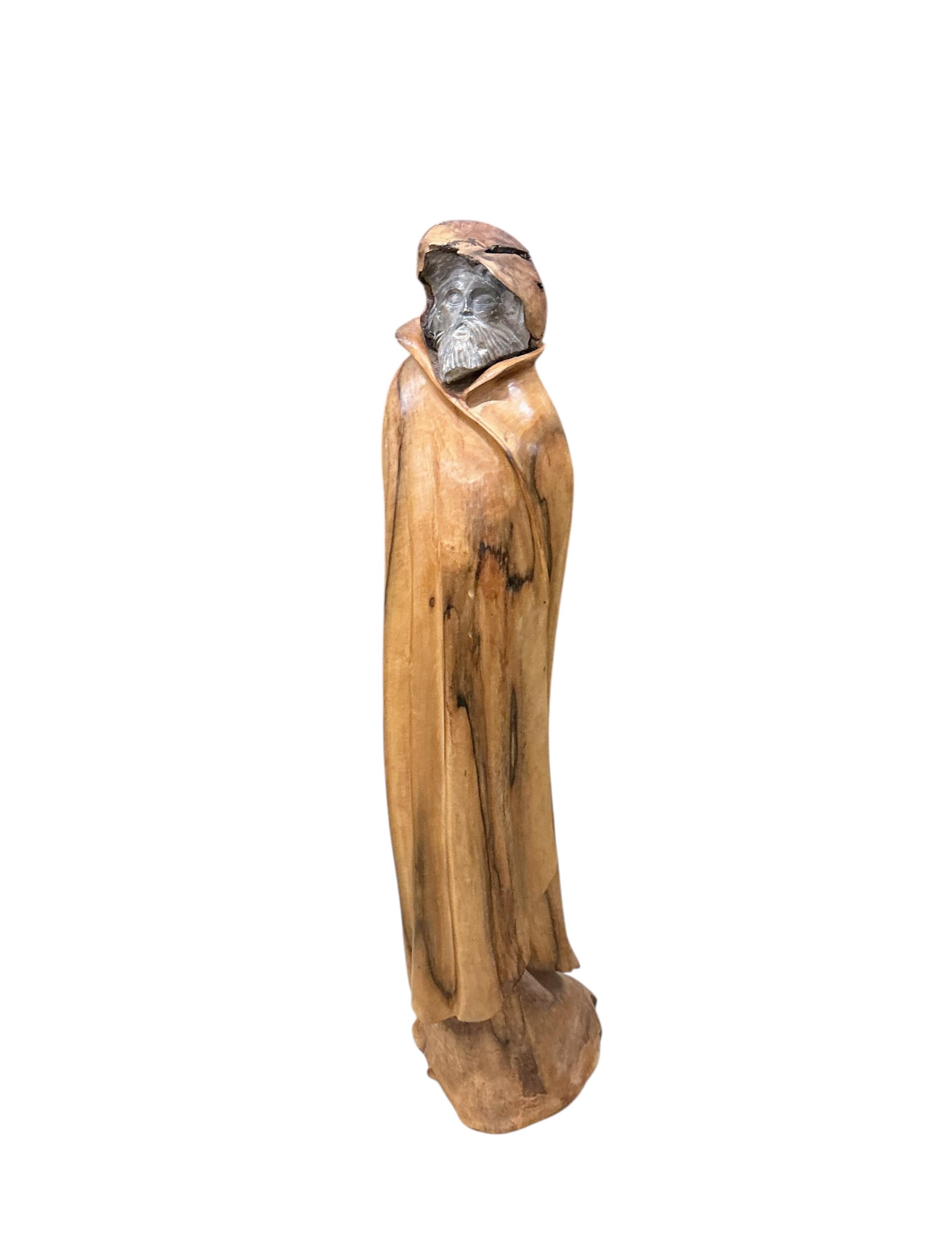 Pierre Decorse (b.1953), a large naturalistically modelled standing figure, probably a cloaked monk, height 116cm